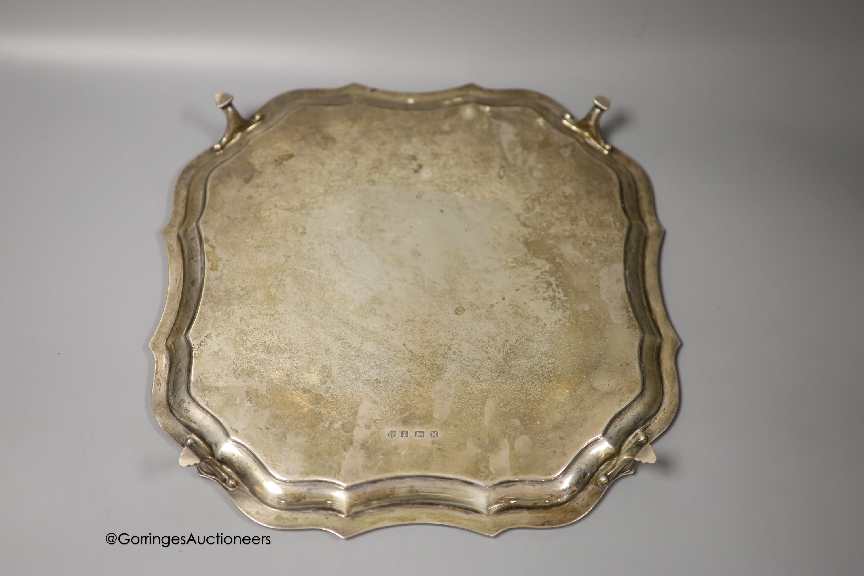 A 1930's shaped square silver salver, Barker Brothers Silver Ltd, Birmingham, 1936, 33.1cm